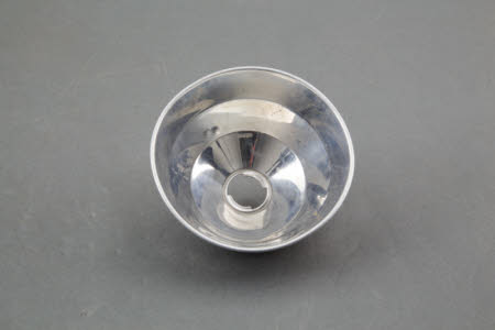 A reflector for an Agfa KM flash unit.