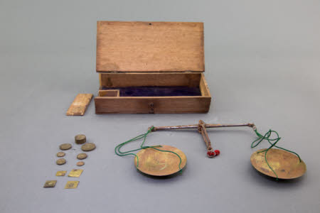 Apothecary beam and pan scale, with weights, in original wooden box.