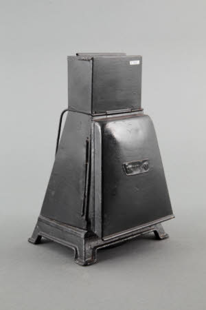 Refulgent paraffin burner safelight.