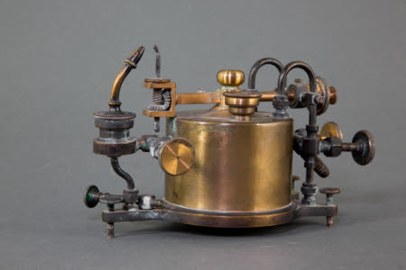Lanternist's lamp. Oxy ether saturator and jet combination to burn lime