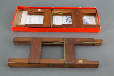 Two R.R. Beard Eclipse slide changers; one in original box.