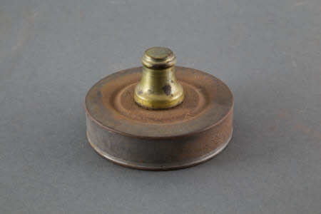 Metal spirit burner with screw cap lid and wick.