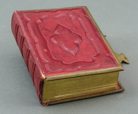 A 19th Century carte-de-visite photograph album bound in red embossed leather.