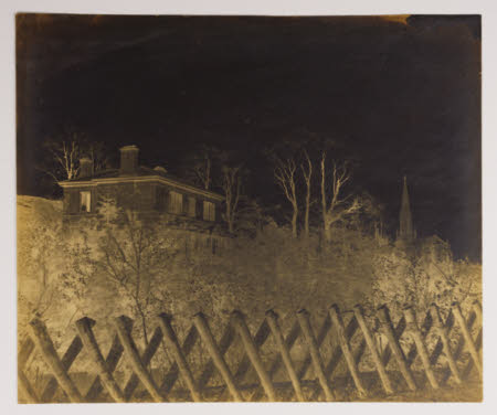 House with trees and church steeple