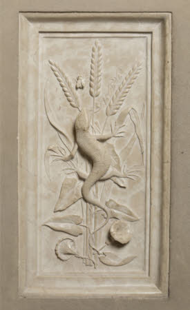 Marble relief of a Lizard climbing stalks of corn entwined with convolulus, trying to reach an ...