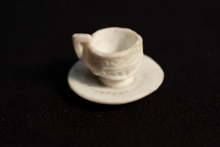 Doll's house cup and saucer